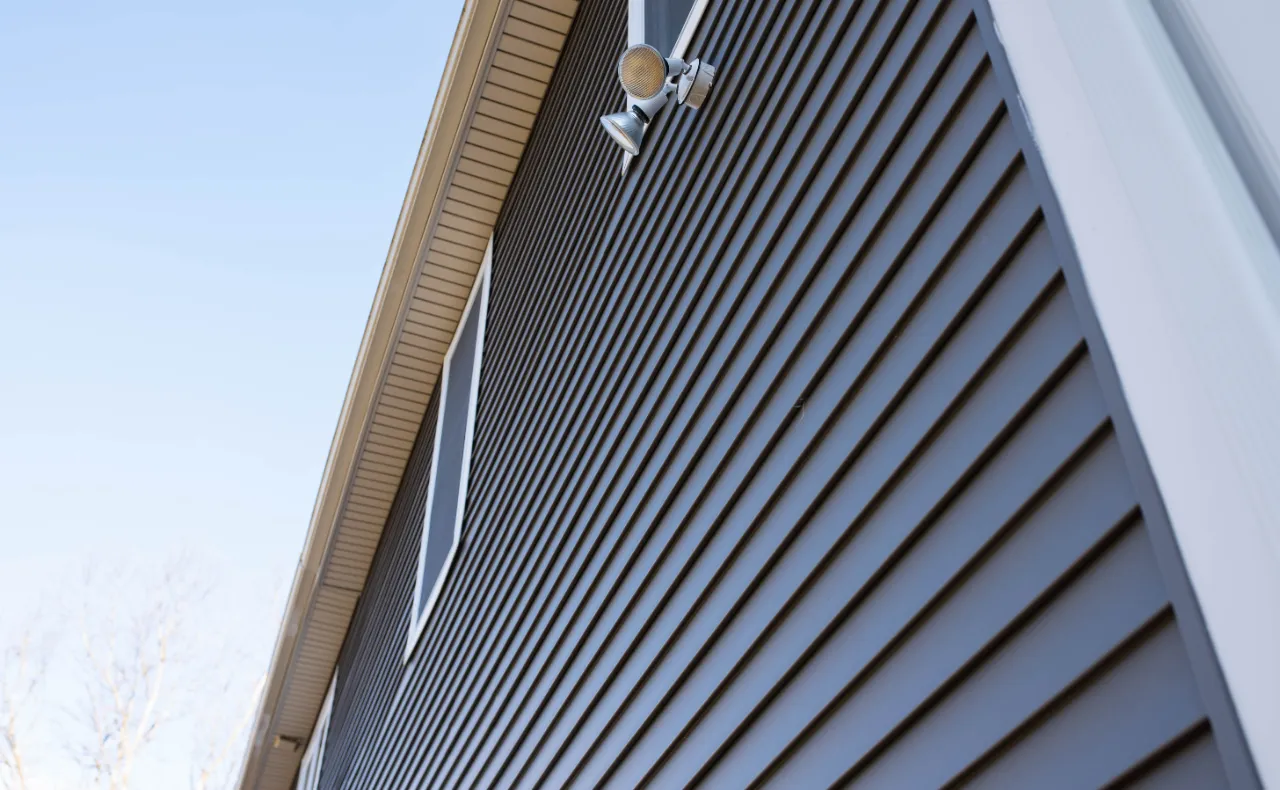 Siding installation in progress on a house in New York